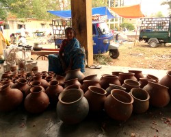 Buy earthen pots from local villagers at weekly fair