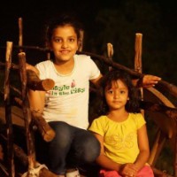 Kids portraits on bullockcart