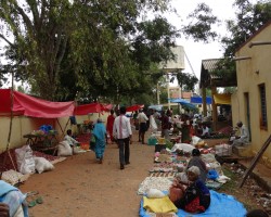 Villagers buy sell in weekly market