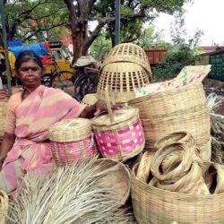 lady-selling-cane-artifatcs-brooms
