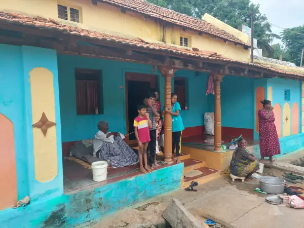 Children Interacting with Village Families During ChukkiMane Activity