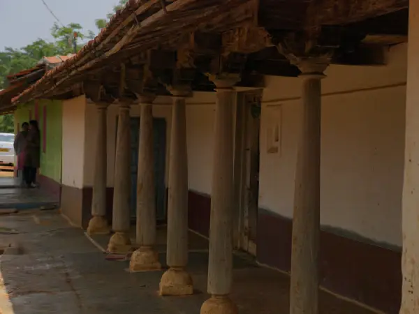 Local Artisan with Traditional Woven Crafts in the Village