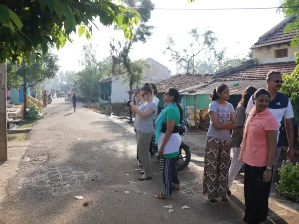 Visitors Exploring Heritage Structures in Belakavadi Village
