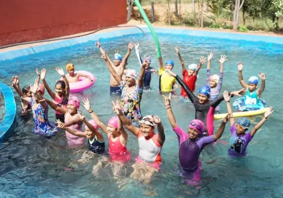 Kids playing in the village pool