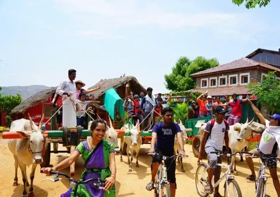 family-enjoying-bullock cart-ride-at-chukkimane