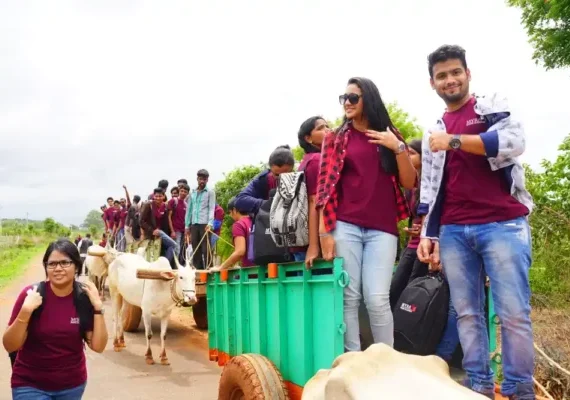 Visitors experiencing Village life
