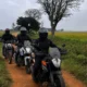 Bikers riding through Karnataka countryside near ChukkiMane