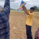 Child learning traditional kite flying at ChukkiMane