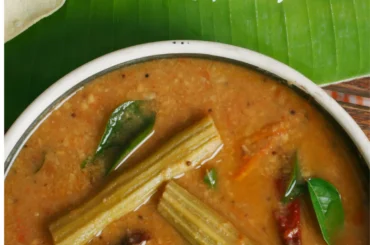 Sambar with rice on banana leaf