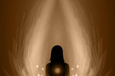 Woman meditating in a peaceful natural setting for relaxation and wellness