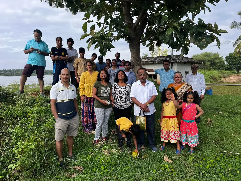 Families enjoying an outdoor nature experience together near the countryside of Karnataka
