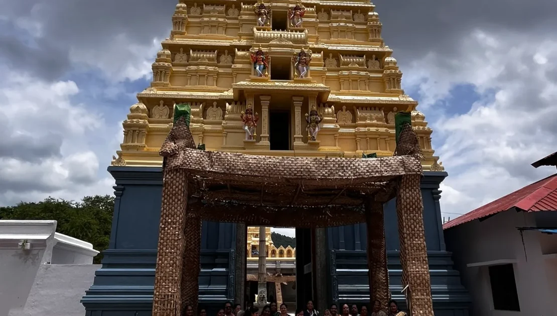 Family group visiting a traditional temple during Dasara